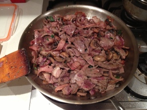 The bacon and liver about to be done